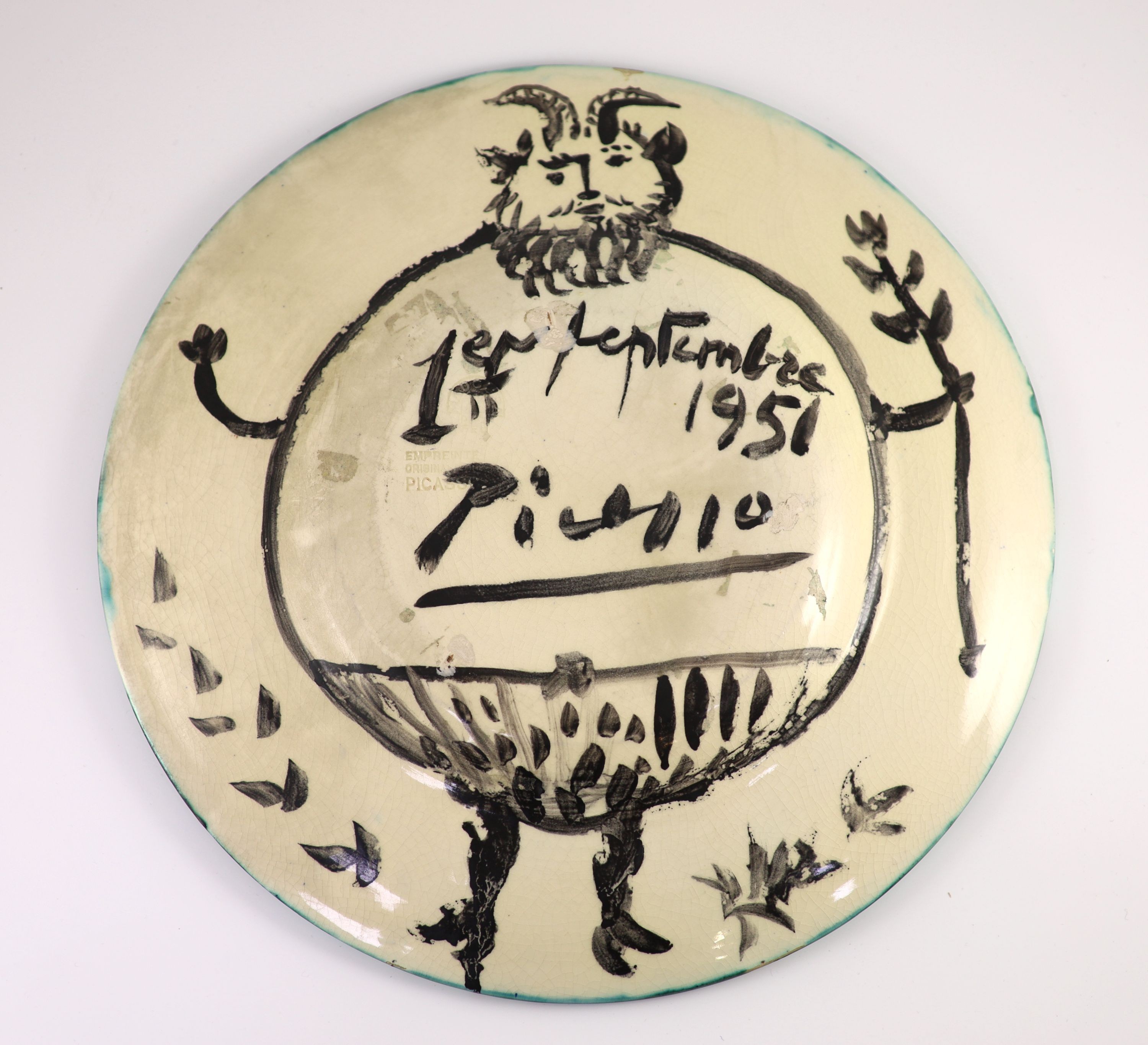 Pablo Picasso (Spanish 1881-1973) for Madoura pottery, a Corrida aux Personnages charger (A.R.104), designed 1950, the rare reverse painted with a faun holding a branch, signed and inscribed ‘Picasso, 1st Septembre 1951’